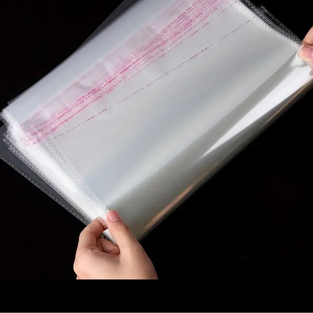 25  Clear Cellophane Bags self adhesive 12”x6”